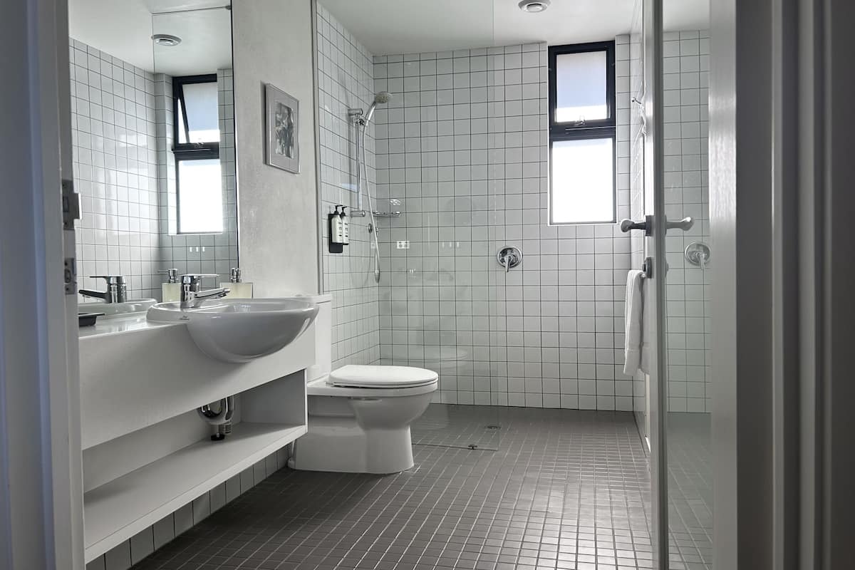 ocean view studio | bathroom | shower, free toiletries, hair dryer, towels