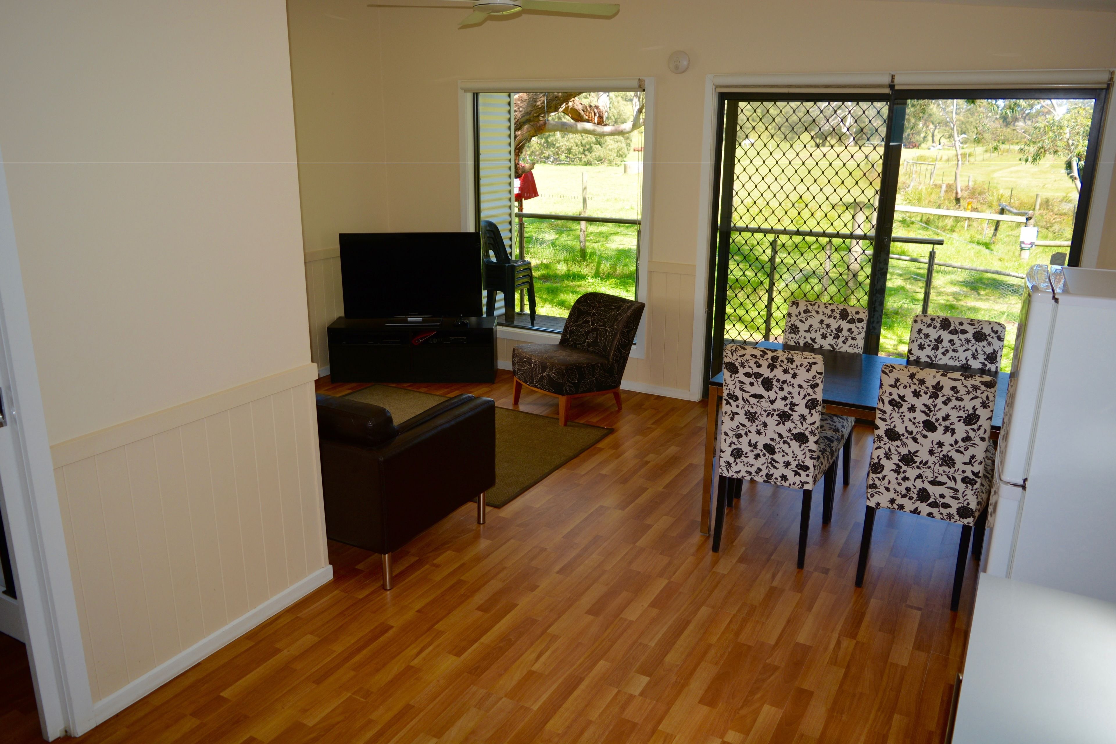 Family Two Bedroom Cabin with Bathroom | Living area | Table tennis