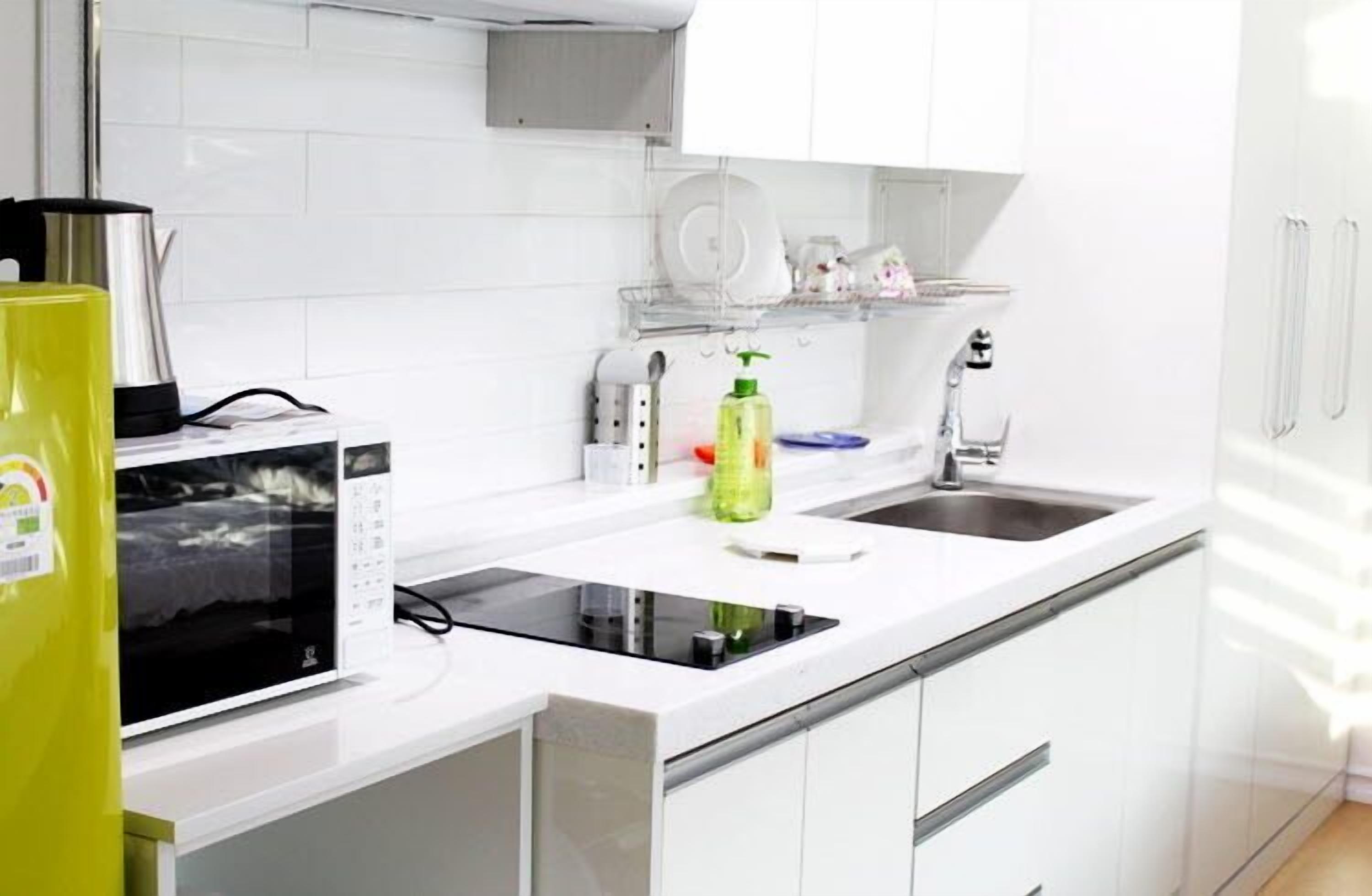 yellow room | private kitchenette | full-sized fridge, microwave, stovetop, electric kettle