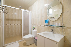 Shower, free toiletries, hair dryer, slippers