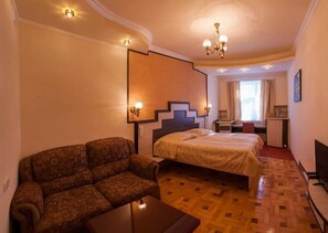 Premium bedding, desk, iron/ironing board, rollaway beds