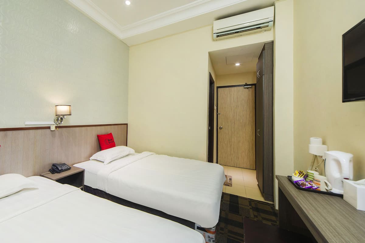 Deluxe Twin kamer (With Window No View) | Verduisterende gordijnen, een strijkplank/strijkijzer, gratis wifi