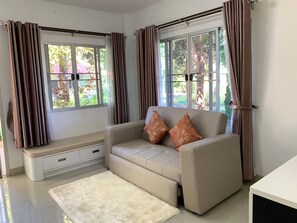 Chambre Double Deluxe | Coin séjour