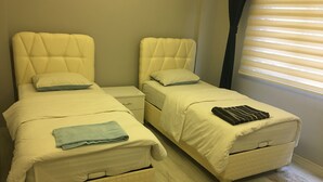 Desk, soundproofing, iron/ironing board (on request), cribs (surcharge) - Batusay Residence (Samsun)