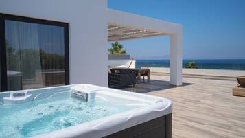 Suite, Outdoor Jetted Tub, Sea View (Penthouse) | 1 dormitorio, ropa de cama de alta calidad, minibar y caja fuerte
