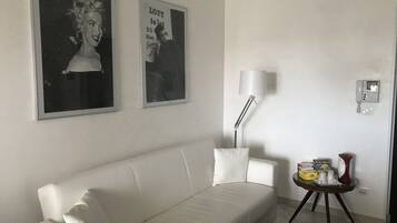 Family Suite, 2 Bedrooms | Living area | 32-inch TV with digital channels