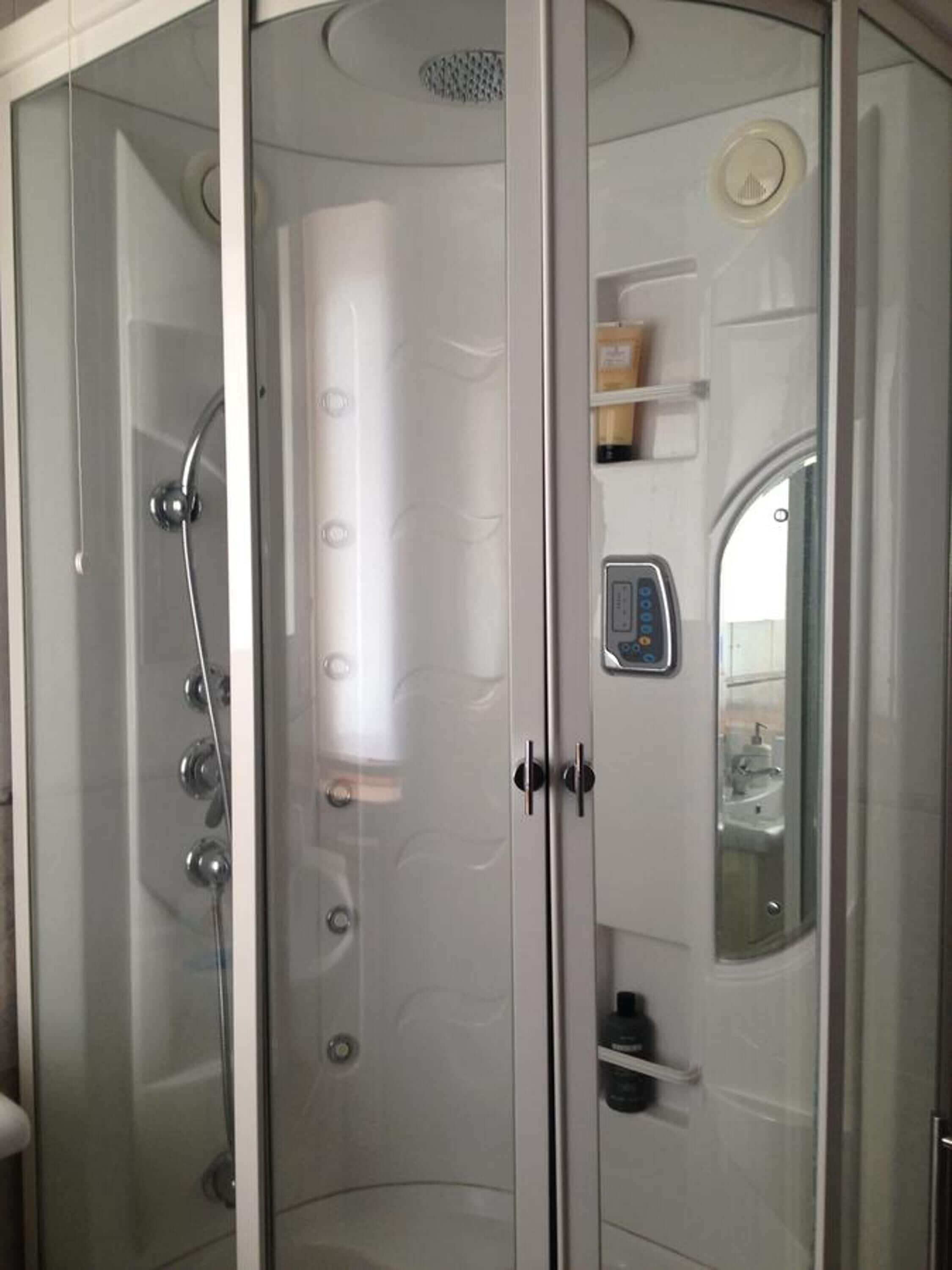 Shower, free toiletries, hair dryer, bathrobes
