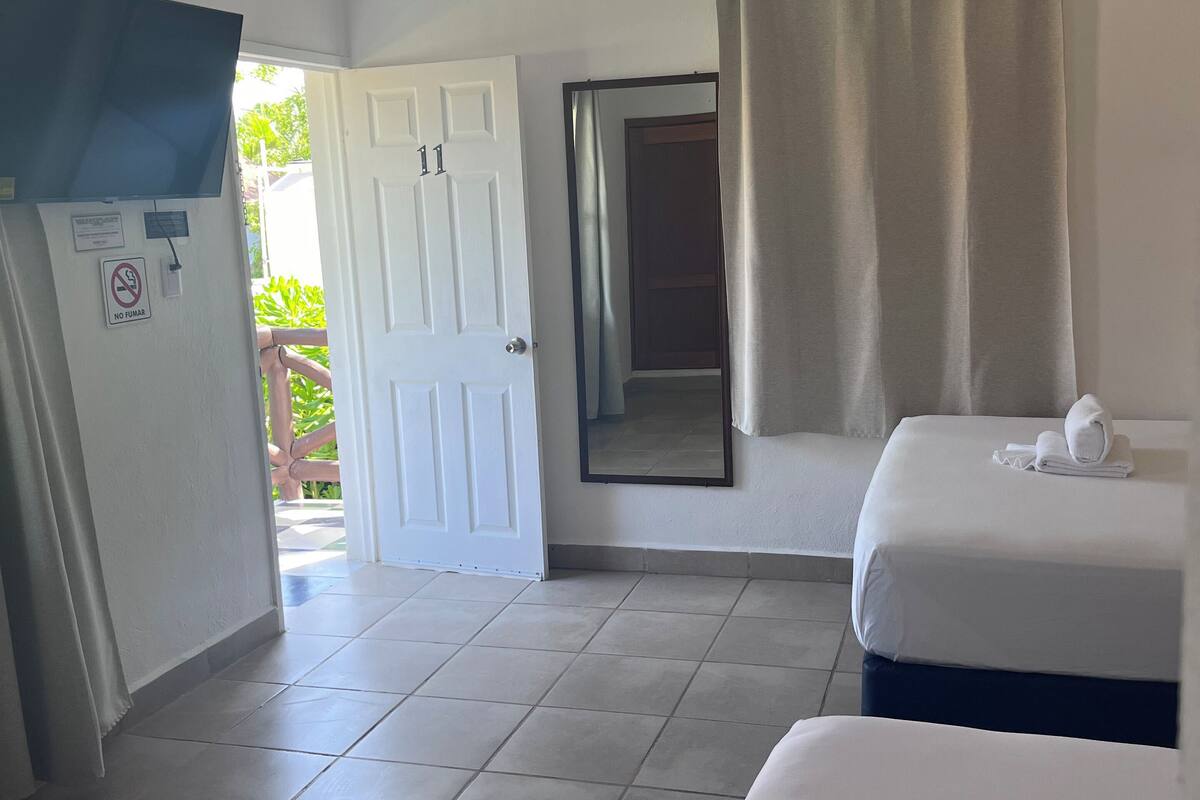 family quadruple room, 2 double beds | blackout curtains, free wifi, bed sheets