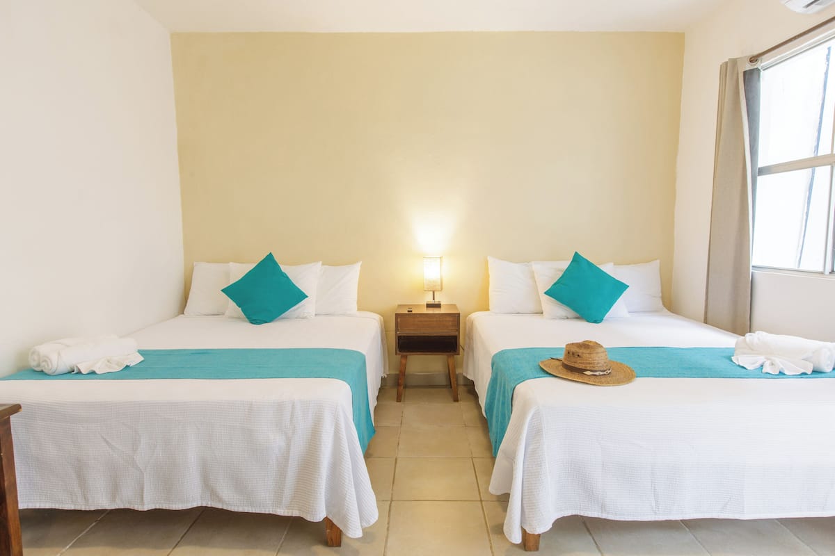 Comfort Quadruple Room | Blackout drapes, free WiFi, bed sheets