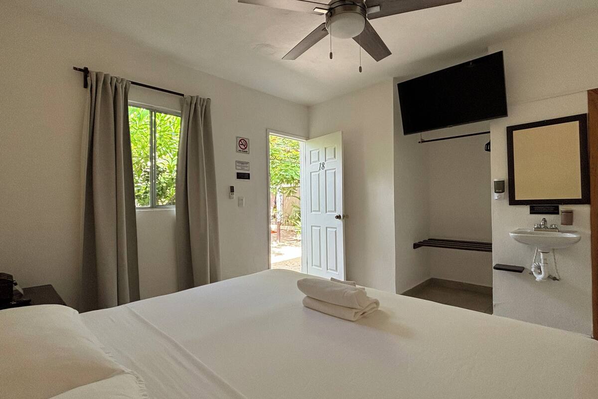 basic double room, 1 king bed | blackout curtains, free wifi, bed sheets