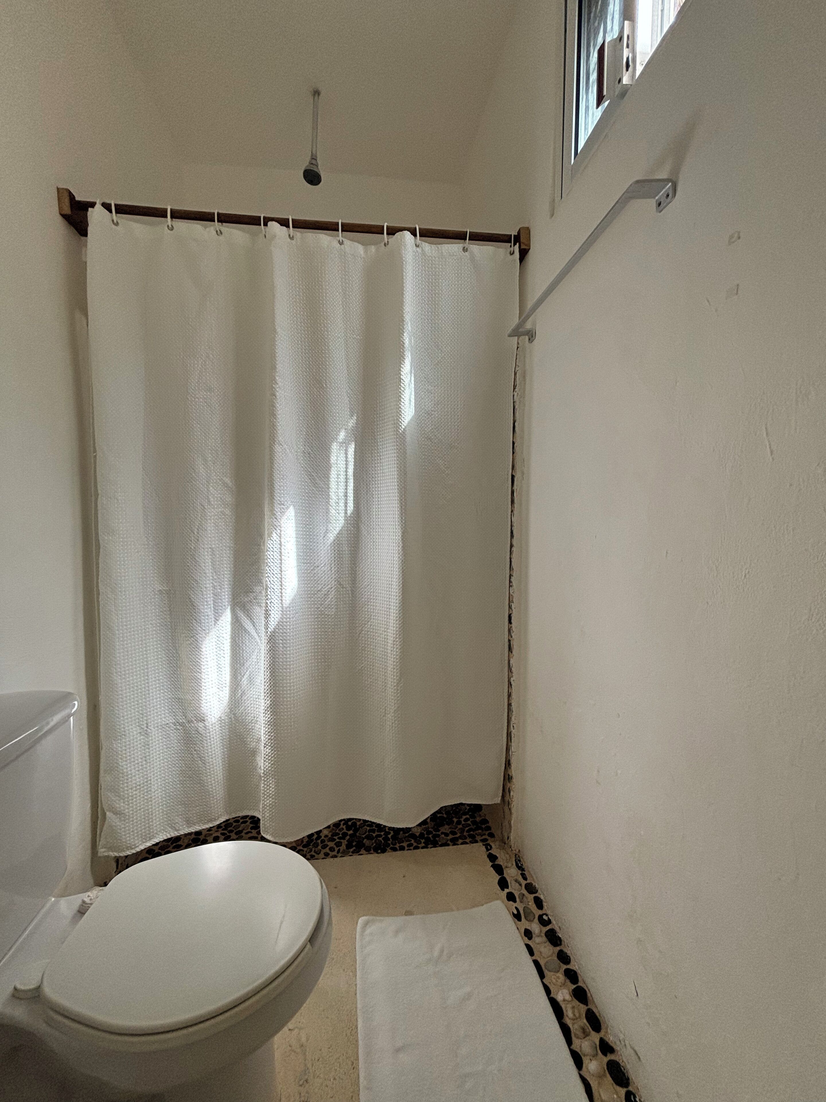 basic double room, 1 king bed | bathroom | shower, free toiletries, towels