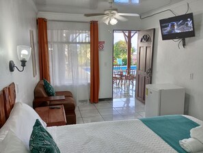 Premium Room, 1 Bedroom, Refrigerator, Pool View | Individually furnished, blackout drapes, bed sheets - Loma Tranquila (San Isidro)