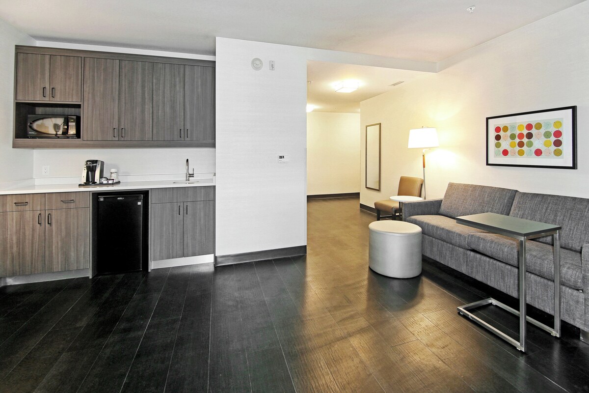 Down comforters, pillowtop beds, in-room safe, desk