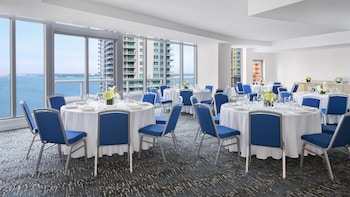 A modern gym with various exercise equipment, including dumbbells, treadmills, and weight machines. at Hyatt Centric Brickell Miami