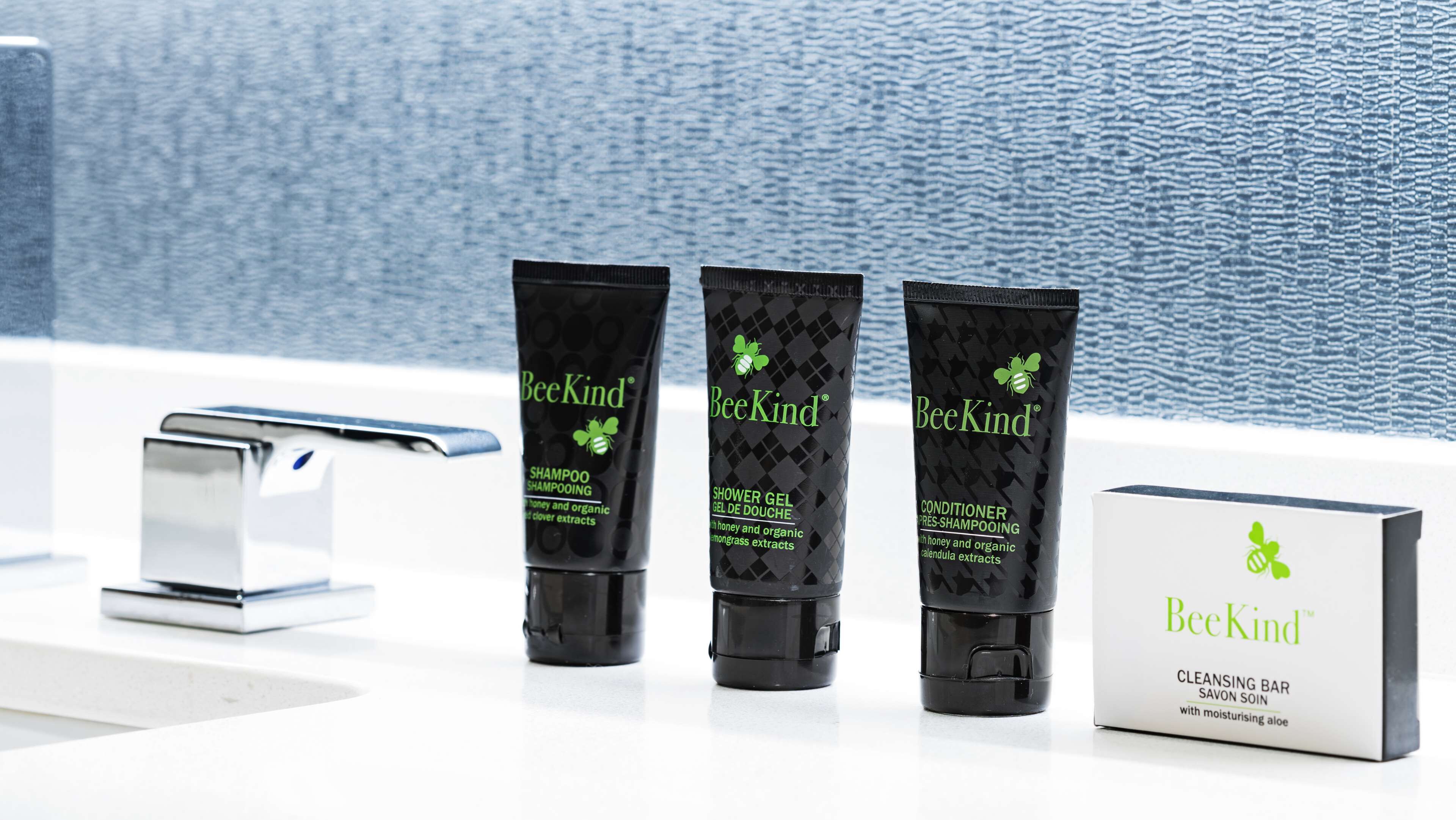 combined shower/bathtub, rainfall showerhead, designer toiletries