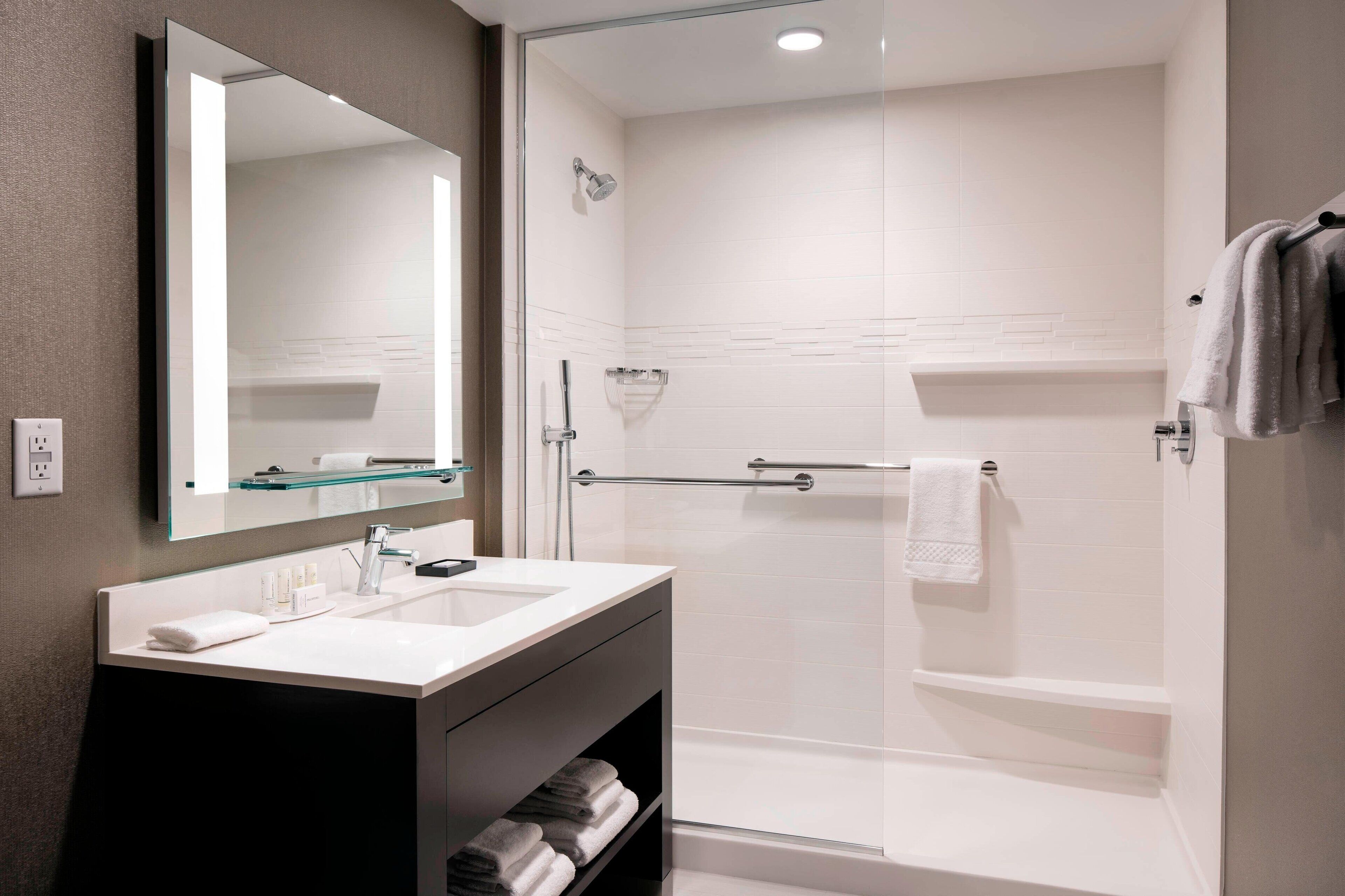 shower, free toiletries, hair dryer, towels