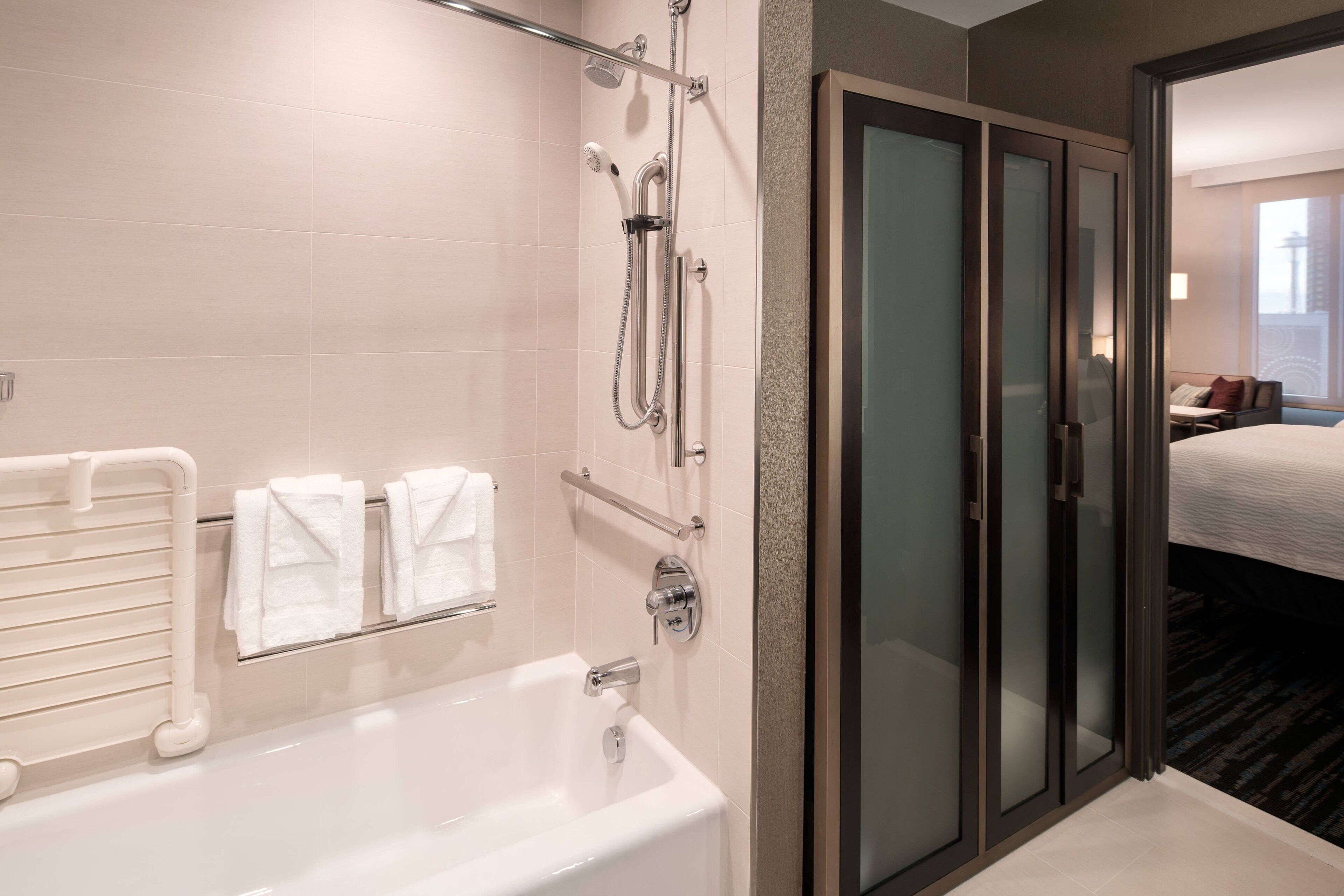 shower, free toiletries, hair dryer, towels