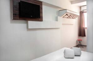 Cortinas blackout, wifi gratis y ropa de cama 