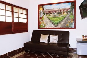 Habitación Deluxe doble, balcón | Zona de estar
