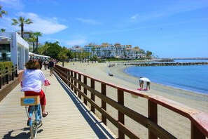 On the beach, sun-loungers, beach towels - Beachside Puerto Banus Stunning Apartment 212 (Marbella)