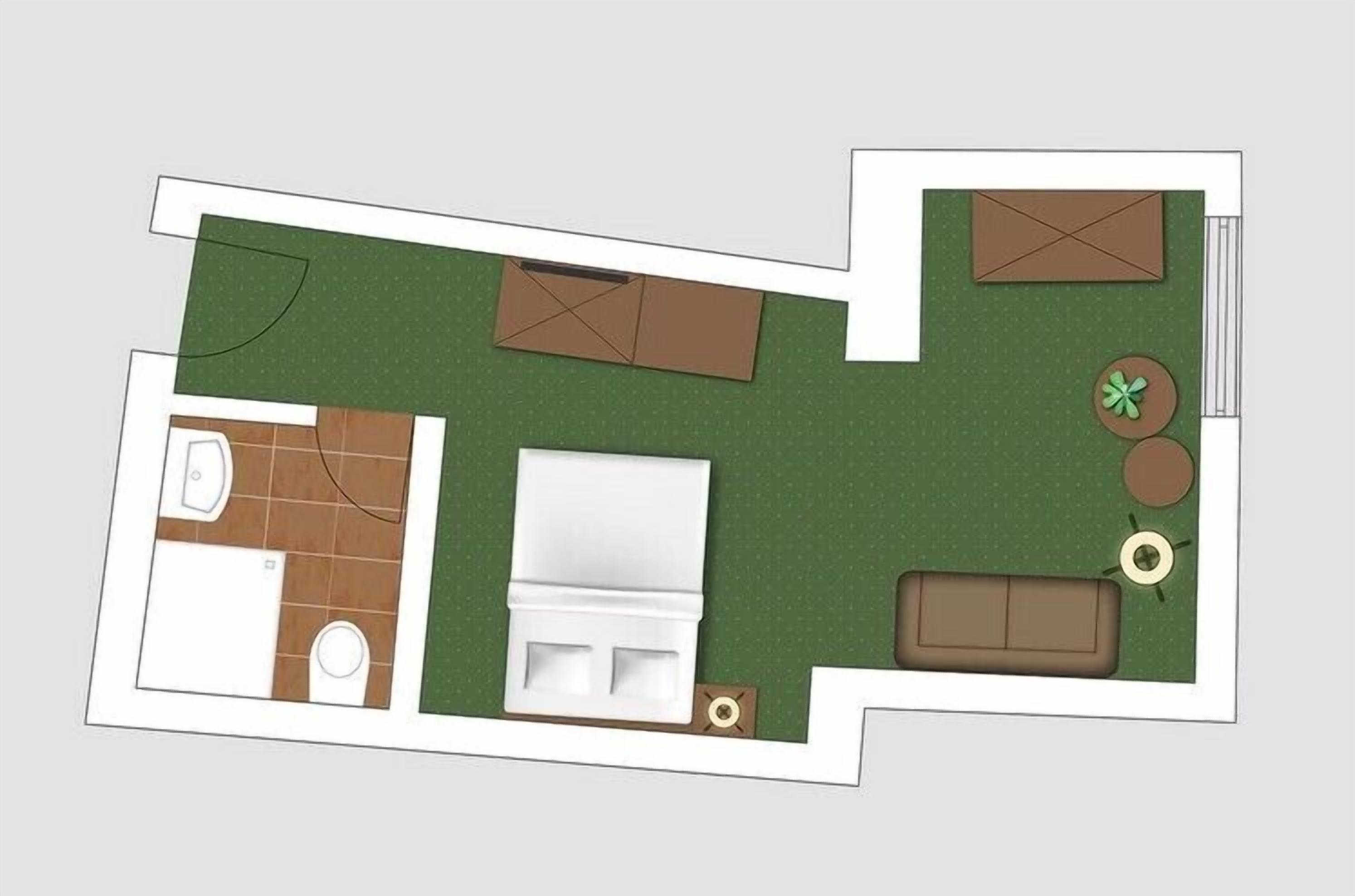 A floor plan of a hotel room with a bathroom, a bed, a small seating area, and a garden view.