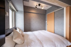 Chambre double | 1 chambre, systĂšme dâinsonorisation, fer et planche Ă repasser