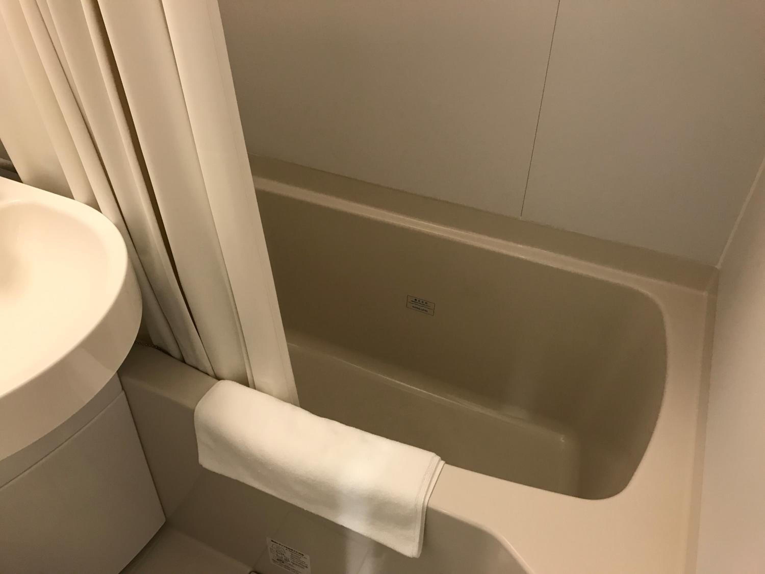 combined shower/bathtub, free toiletries, hair dryer, bathrobes