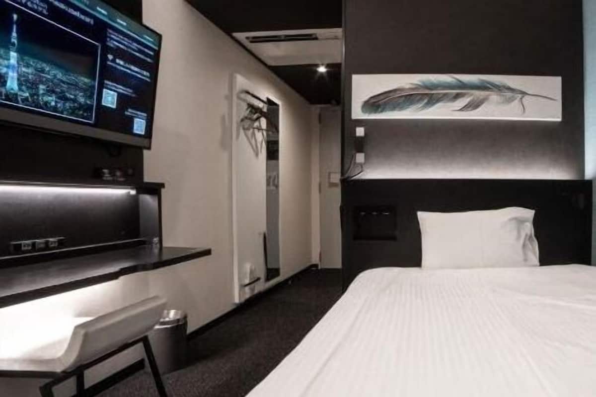 In-room safe, desk, laptop workspace, blackout curtains