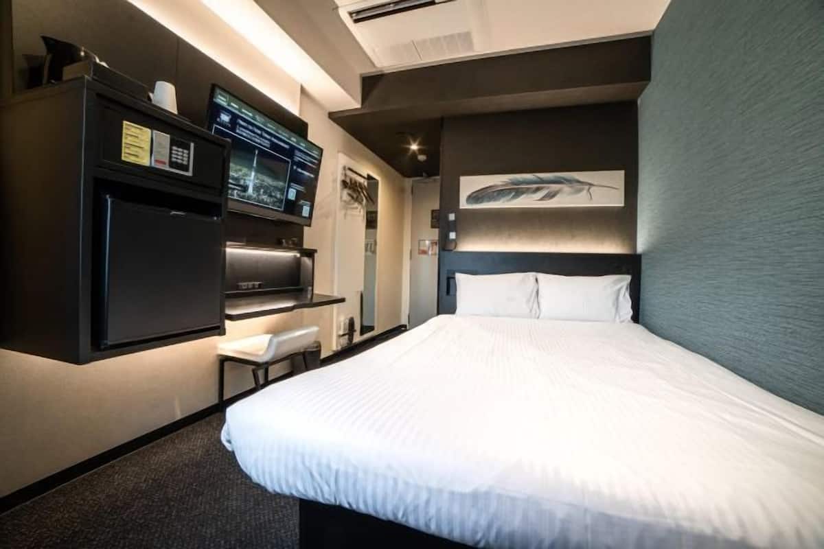 In-room safe, desk, laptop workspace, blackout curtains