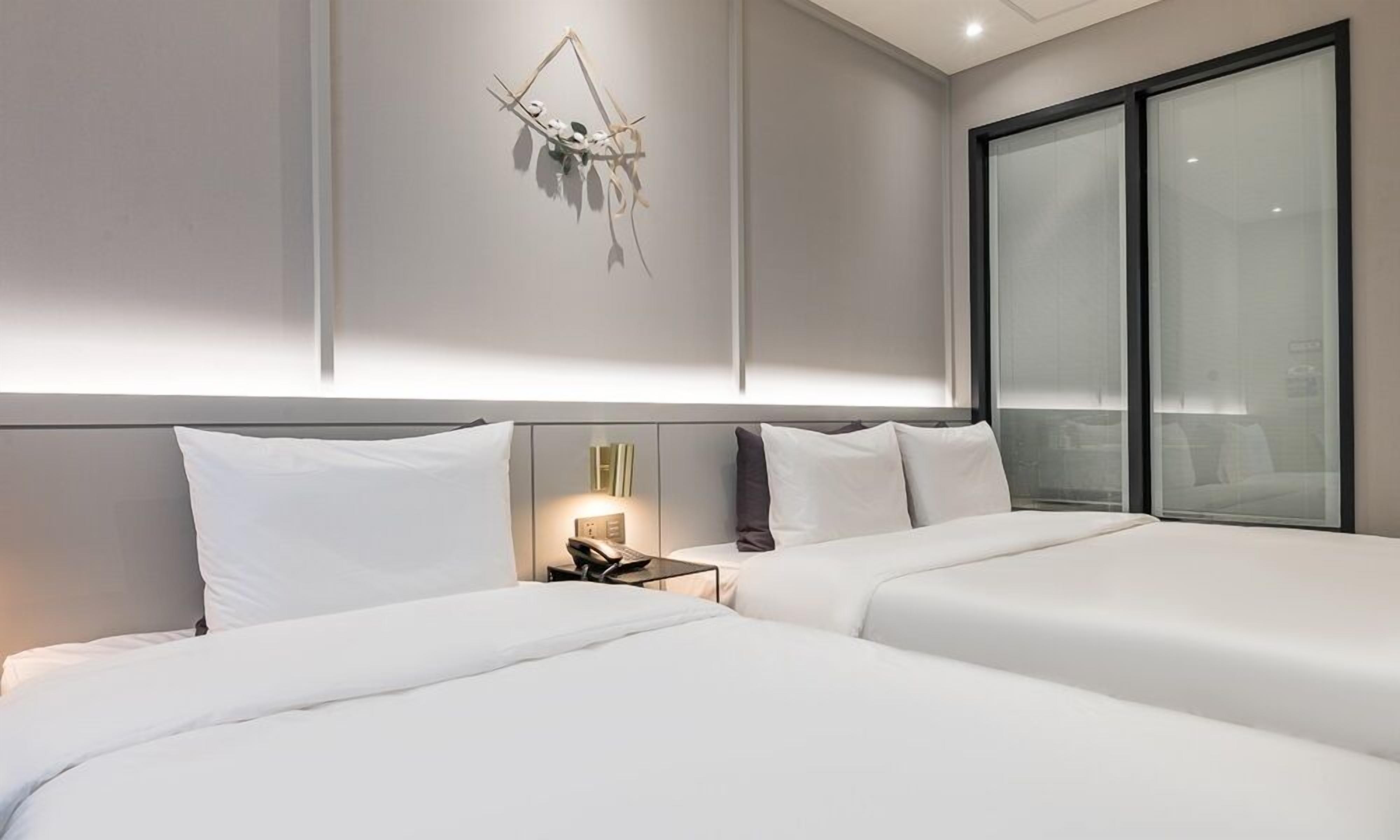 new building a - twin | down duvets, memory-foam beds, individually decorated