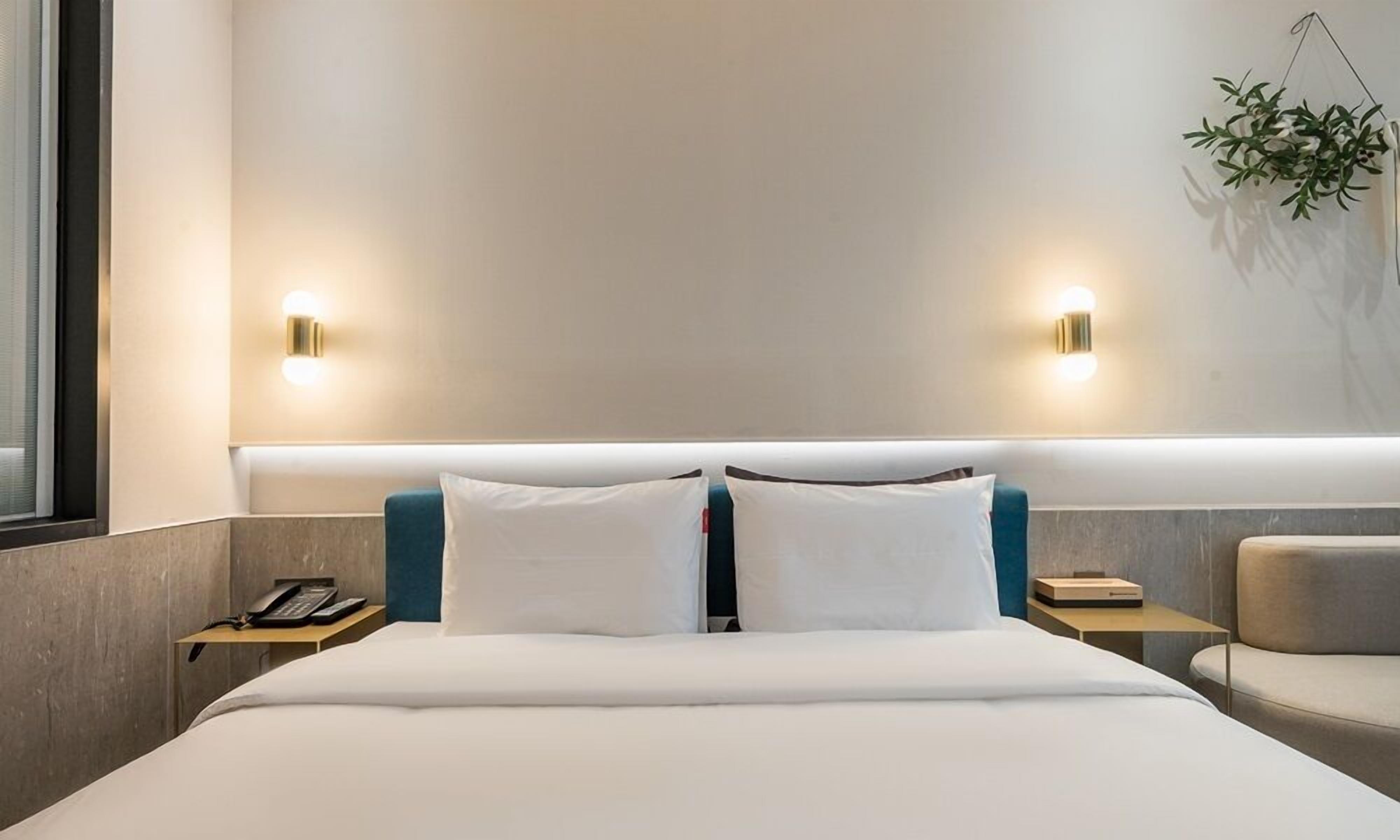 new building a - deluxe | down duvets, memory-foam beds, individually decorated