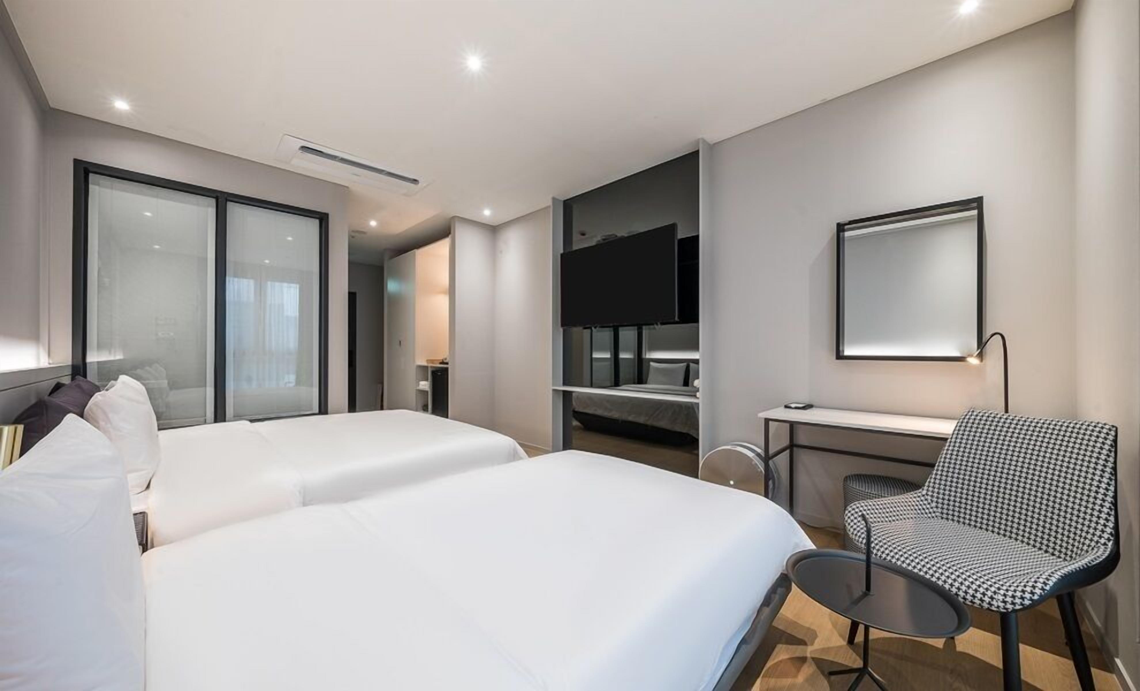 new building a - twin | down duvets, memory-foam beds, individually decorated