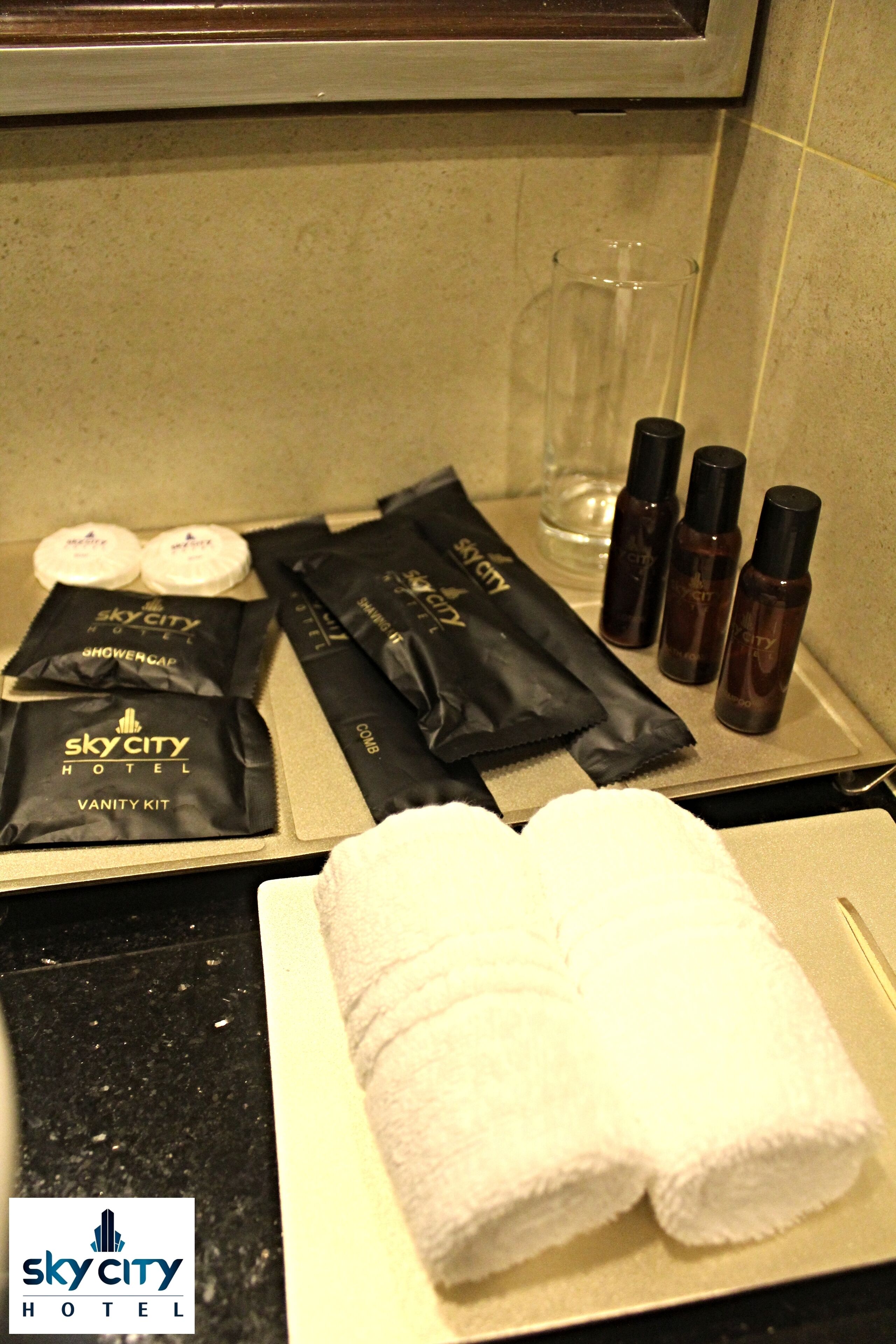 rainfall showerhead, designer toiletries, hair dryer, bathrobes