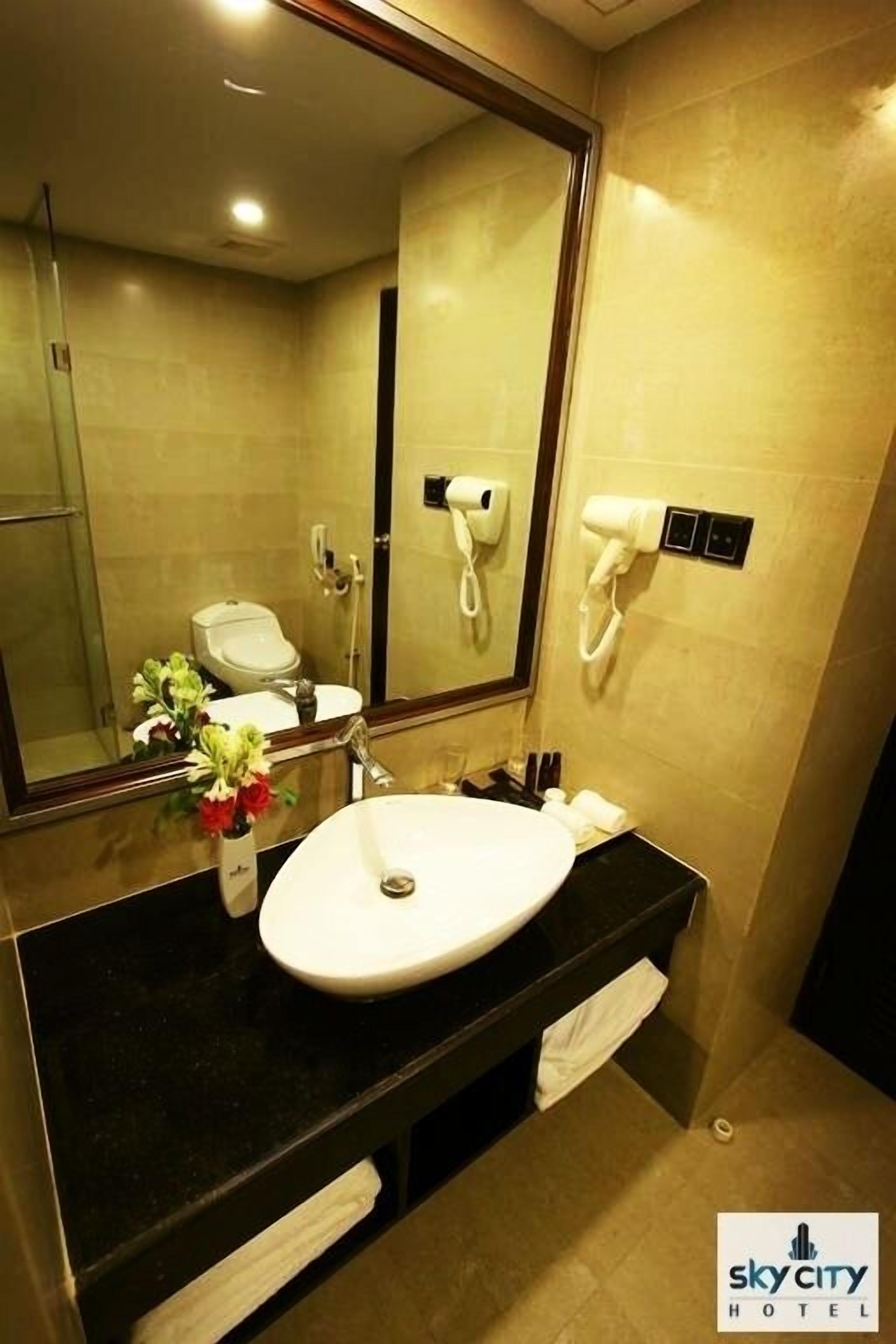 rainfall showerhead, designer toiletries, hair dryer, bathrobes