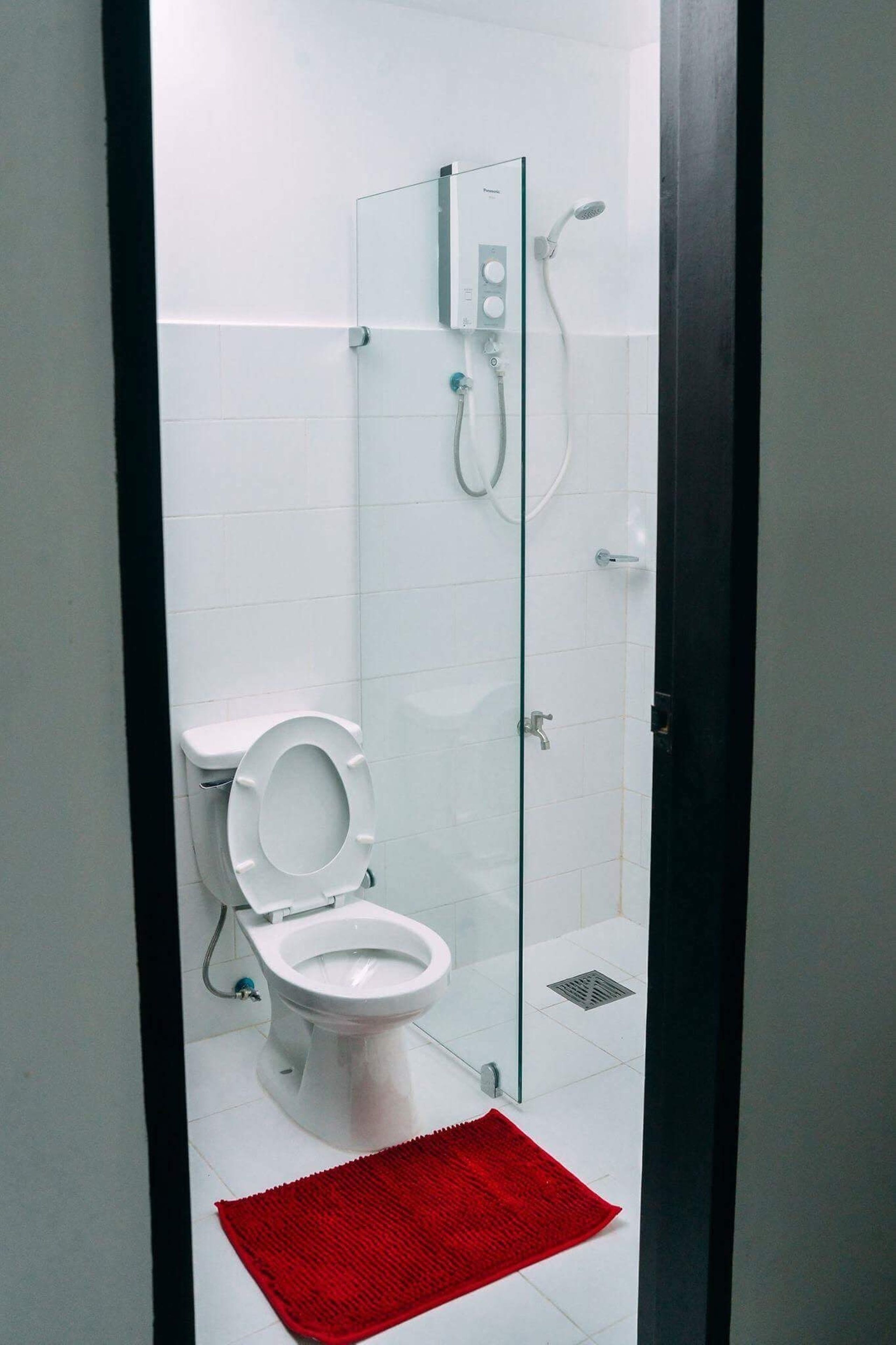 shower, free toiletries, slippers, towels