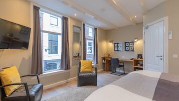 Ropa de cama de alta calidad y minibar