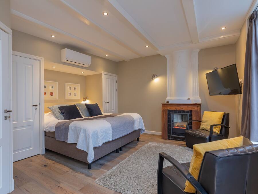 Suite Superior, 1 letto king | Biancheria da letto di alta qualità, minibar, una cassaforte in camera