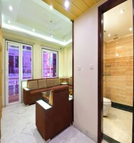 Suite Room with City View | Desk, blackout drapes, soundproofing, free WiFi