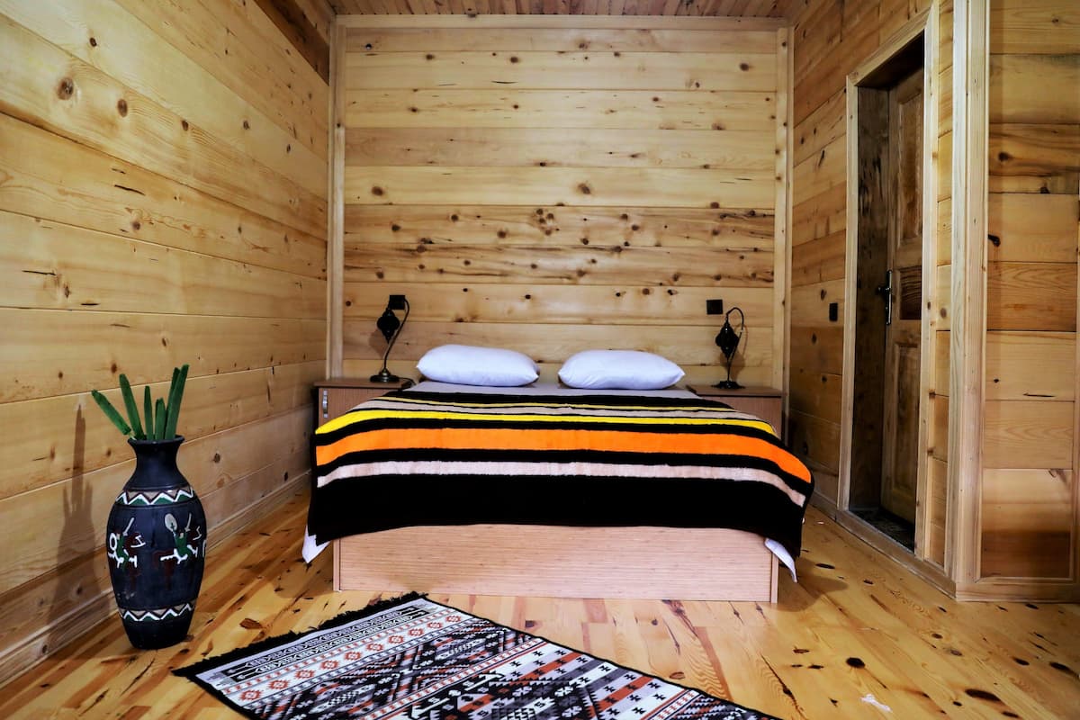 Suite, Private Bathroom, Garden View | 1 bedroom, blackout drapes, iron/ironing board, free WiFi