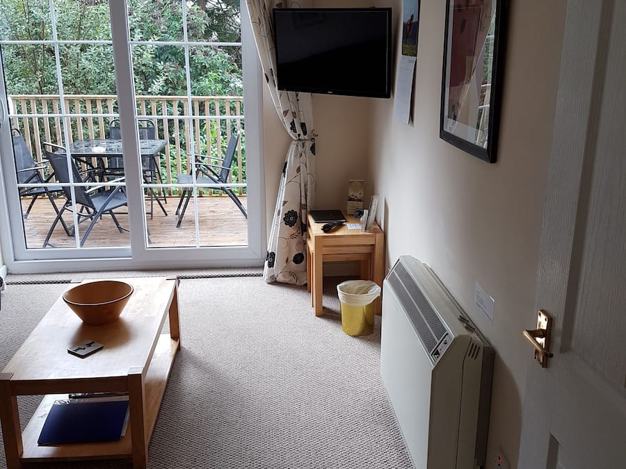 Apartment, 2 Bedrooms | Living room | Flat-screen TV