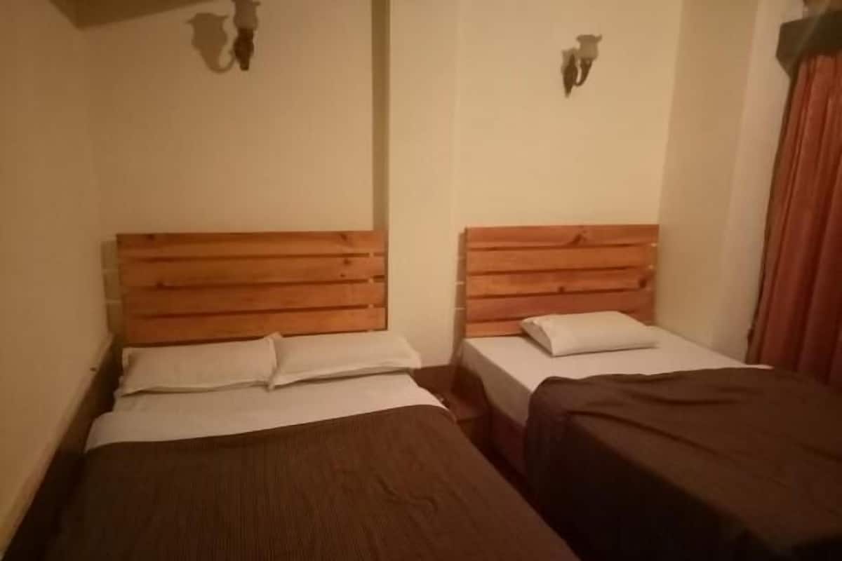 Suíte família, 1 cama de casal | Camas extras/dobráveis (sobretaxa), Wi-Fi de cortesia