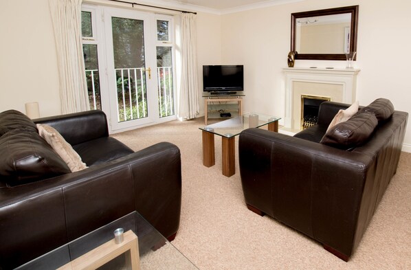 Apartment, 2 Bedrooms | Living area | Flat-screen TV