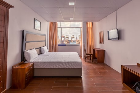 In-room safe, soundproofing, iron/ironing board, rollaway beds. Metro Port City Hotel