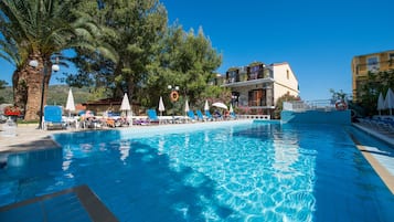 Seasonal outdoor pool, pool umbrellas, sun loungers