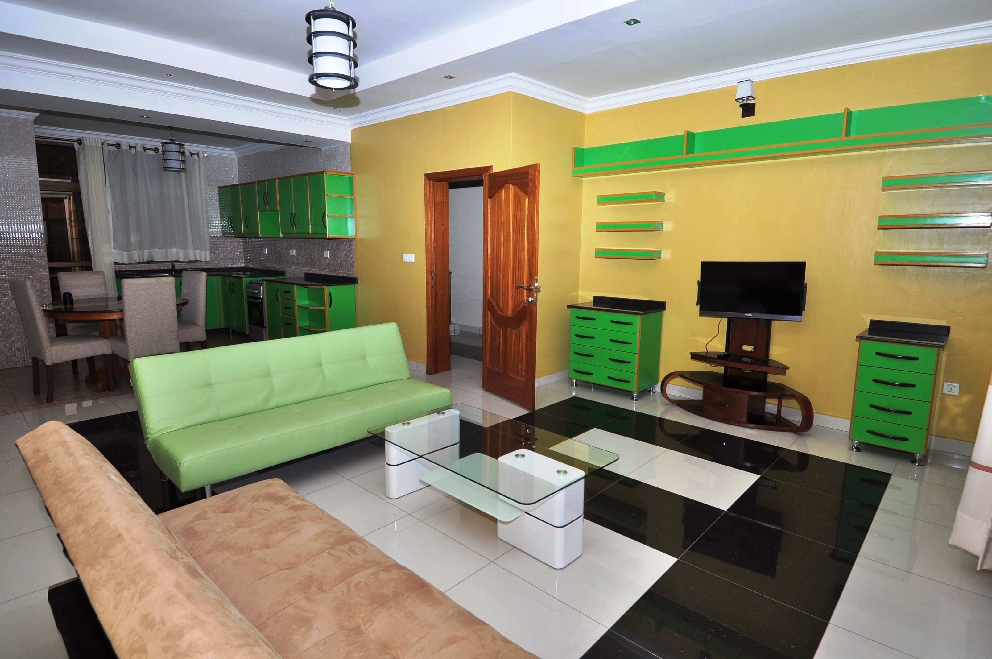 Apartamento luxo, 2 quartos | Área de estar | TV de tela plana