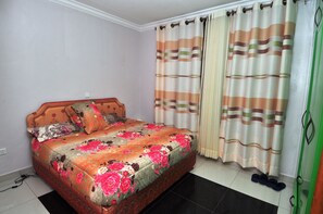 Deluxe Apartment, 2 Bedrooms | 2 bedrooms, in-room safe, iron/ironing board - Rezider Apartment (Kigali)