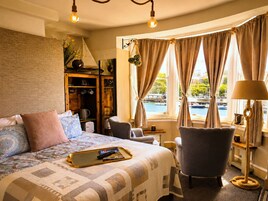 Ropa de cama de alta calidad y tabla de planchar con plancha 