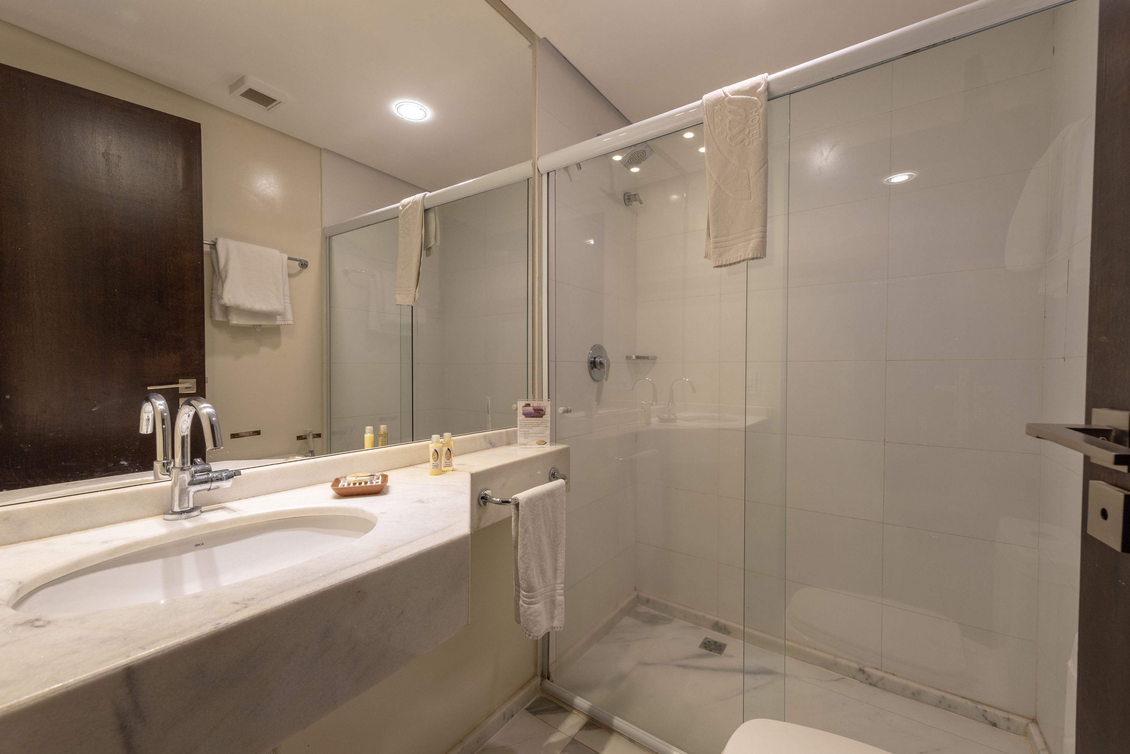 deluxe double room (class) | bathroom | shower, free toiletries, hair dryer, towels