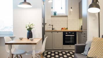 Studio, Non Smoking | Living area | Flat-screen TV