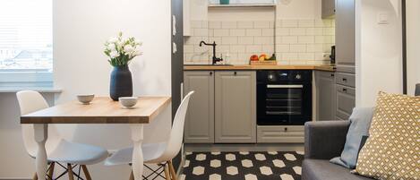 Studio, Non Smoking | Living area | Flat-screen TV